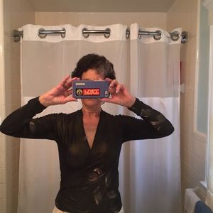 Elegant black and gold crossover blouse